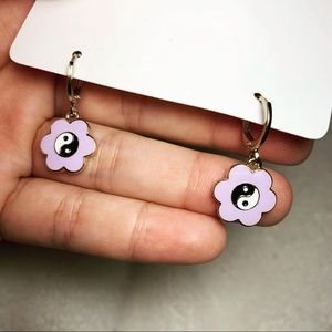 Purple flower with yin and yang